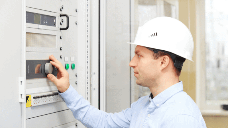 A man is implementing inspection methods.